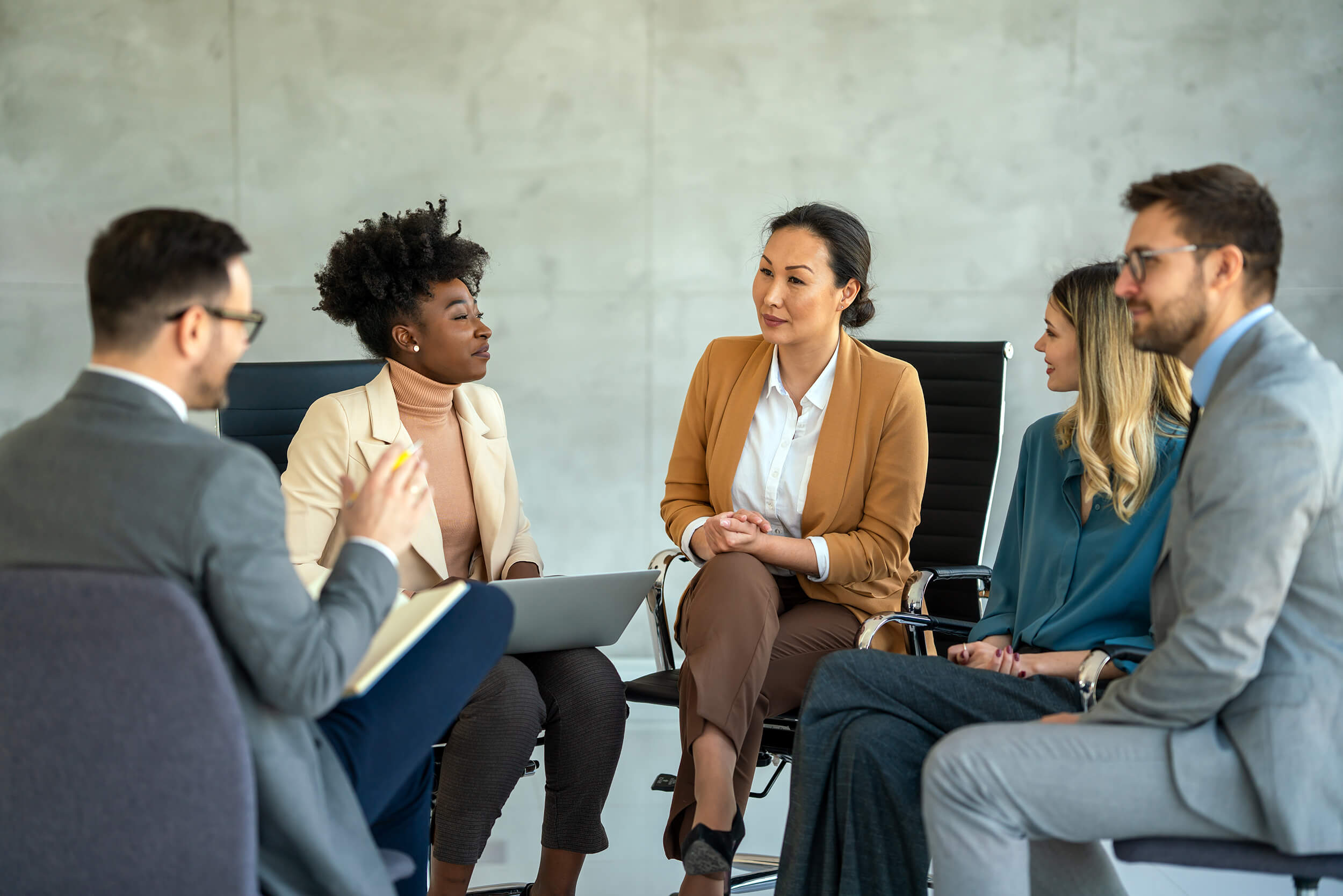 group of peer professionals engaged in discussion