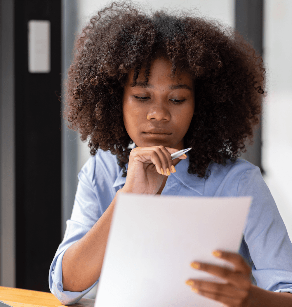 woman reviewing documents